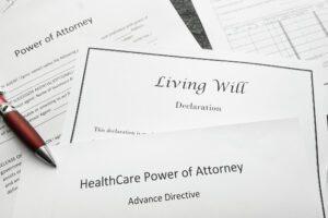 Close up of Living Will, Power of Attorney, and Advance Directive Documents Probate Administration