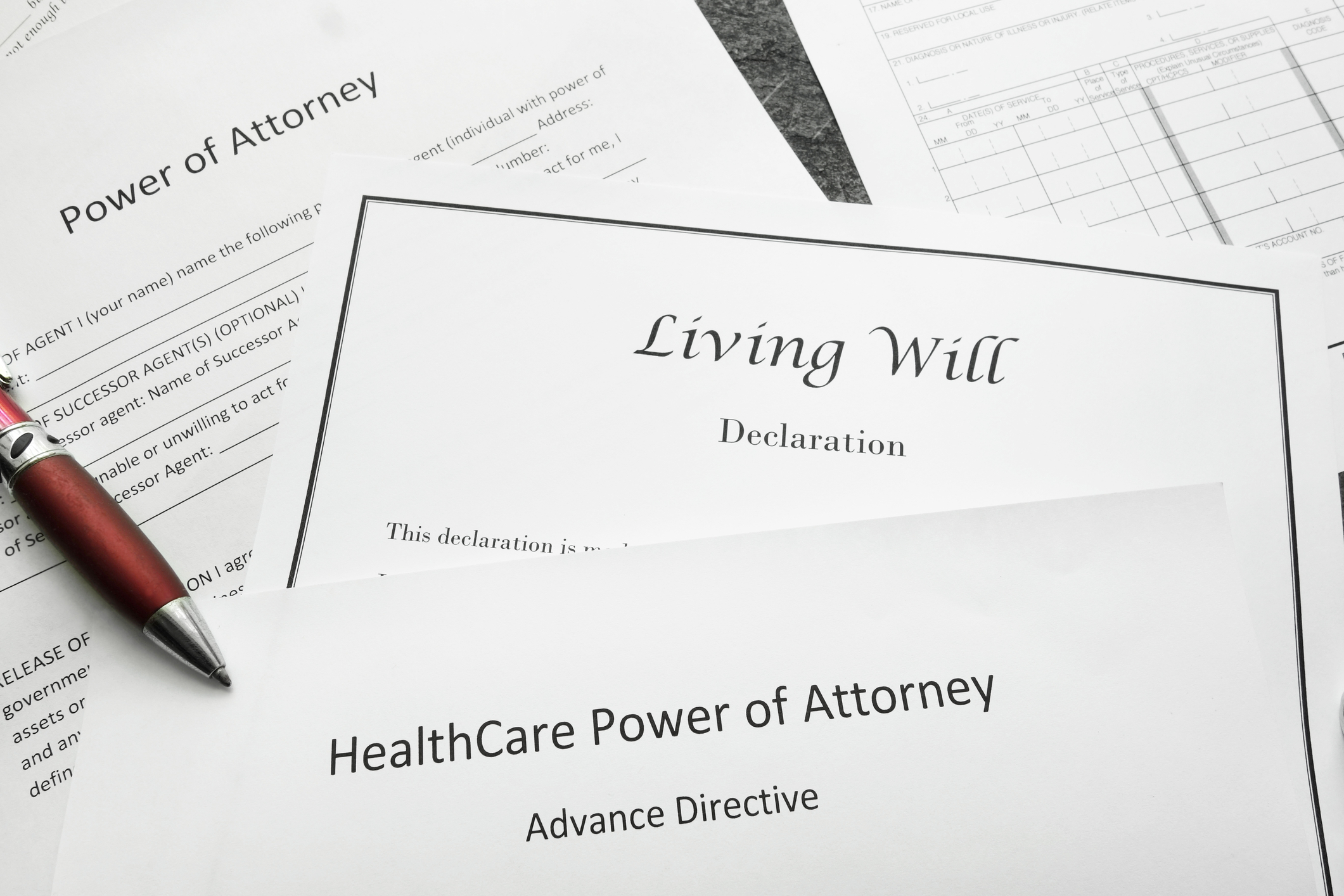 Close up of Living Will, Power of Attorney, and Advance Directive Documents Probate Administration